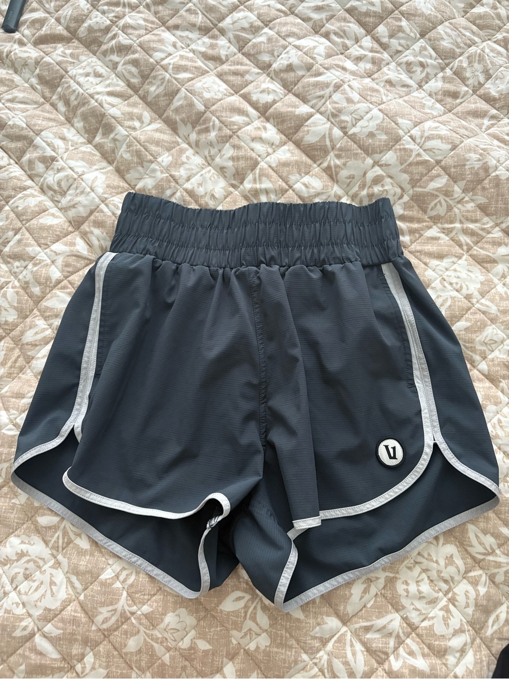 Vuori Dark Gray Athletic Running Shorts with White Trim